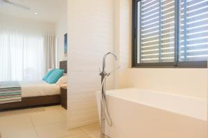 Кровать или кровати в номере Cap Ouest by Horizon Holidays