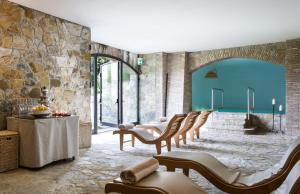 Voodi või voodid majutusasutuse Villa Campomaggio Resort & SPA toas