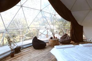 Voodi või voodid majutusasutuse Elsesi Racha Glamping toas