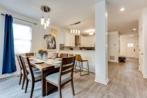 a dining room and kitchen with a table and chairs at Luxury Atlanta Home - Self Check-in Pet Friendly Free Parking in Atlanta