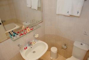 Baðherbergi á Aphrodite Hotel