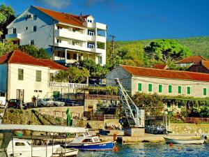 a group of boats are docked in a marina at Apartments Vesna in Tivat