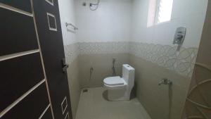 Koupelna v ubytování Hotel Akshith Inn