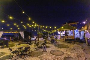 Restoran või mõni muu söögikoht majutusasutuses Batuque Town Villa