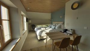 Postel nebo postele na pokoji v ubytování B&B Entre Champs