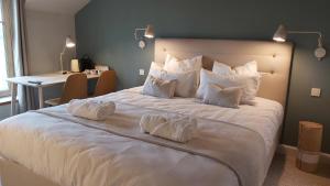 Postel nebo postele na pokoji v ubytování B&B Entre Champs