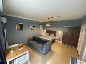 Postel nebo postele na pokoji v ubytování Flats Company - Karakoy Apartment