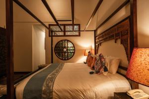 Letto o letti in una camera di Hotel Penaga