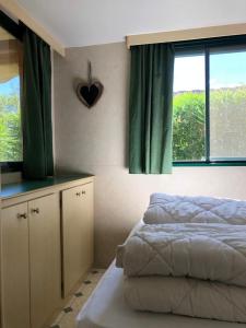 Kép Toskana-Viareggio-Chalet-Zona-Rosa-5-mit-Klimaanlage-und-Wlan szállásáról Viareggióban a galériában