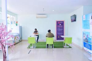 TV a/nebo společenská místnost v ubytování Cordex Hotel Ancol