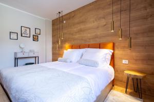 Posteľ alebo postele v izbe v ubytovaní Plitvice Village