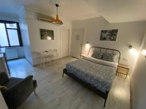 Postel nebo postele na pokoji v ubytování Flats Company - Karakoy Apartment