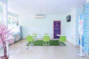 TV a/nebo společenská místnost v ubytování Cordex Hotel Ancol