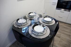 TV a/nebo společenská místnost v ubytování Pearl Apartment
