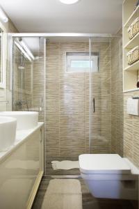 Koupelna v ubytování Pearl Apartment + 37 fotografií