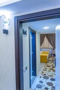 Postel nebo postele na pokoji v ubytování Dündar Hotel