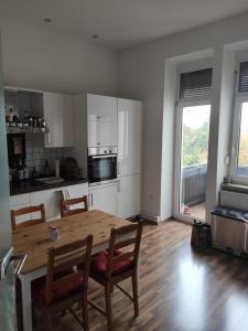 Η κουζίνα ή μικρή κουζίνα στο Joanna Apartment - MA Rheinau 4