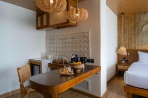 Ein Bett oder Betten in einem Zimmer der Unterkunft Sinae Phuket - SHA Extra Plus