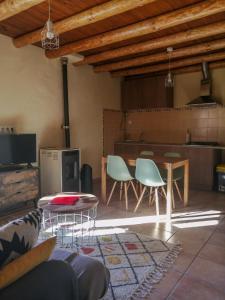 TV a/nebo společenská místnost v ubytování Mas de Pau - Boutique Apartments