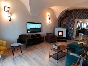L'INATTENDU Vue imprenable,clim,parking avec borne de recharge, ménage inclus的休息区