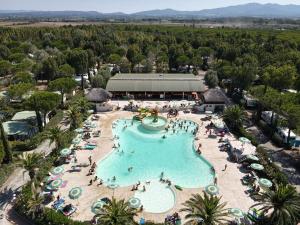 an overhead view of a pool at a resort at Camping Village Free Time in Marina di Bibbona