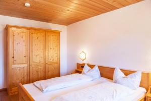 Postel nebo postele na pokoji v ubytování Ferienwohnung Guffertblick