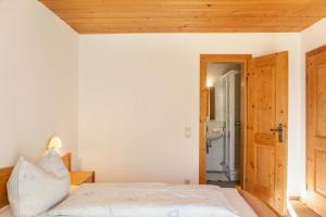 Postel nebo postele na pokoji v ubytování Ferienwohnung Guffertblick