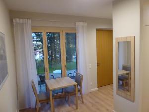 a dining room with a table and chairs at Studio Apartment 2 in Tübingen