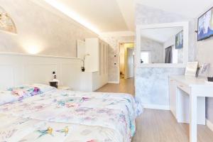 Postel nebo postele na pokoji v ubytování HOTEL Villa Lilla