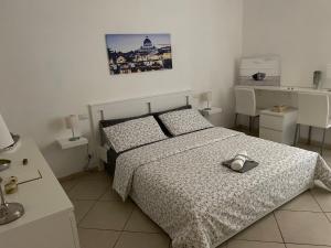 Posteľ alebo postele v izbe v ubytovaní CGH Roma Exclusive