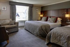Ambleside Salutation Hotel & Spa, World Hotel Distinctive客房内的一张或多张床位