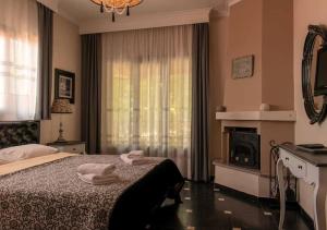 Postel nebo postele na pokoji v ubytování Nikelli