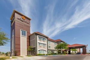 a rendering of the front of a hotel at La Quinta by Wyndham Laredo Airport in Laredo