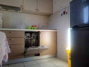 Kuchyňa alebo kuchynka v ubytovaní Holiday apartment in Tribunj with balcony, air conditioning, WiFi, washing machine 5040-1 + 20 fotografií