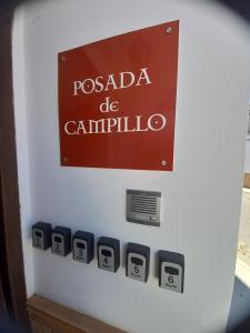 a sign that reads pasada de campula on a wall at Posada de Campillo in Campillo de Altobuey +1 photo