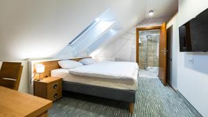 Postel nebo postele na pokoji v ubytování Port Bogaczewo Hotel & SPA