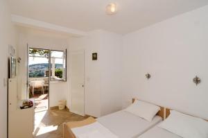 Posteľ alebo postele v izbe v ubytovaní Guest House Misita