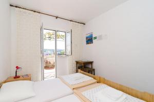 Posteľ alebo postele v izbe v ubytovaní Guest House Misita