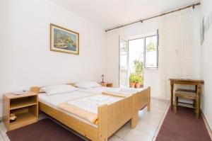 Posteľ alebo postele v izbe v ubytovaní Guest House Misita
