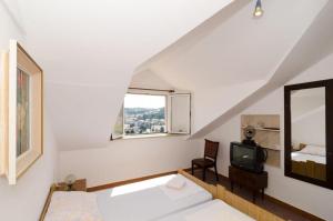Posteľ alebo postele v izbe v ubytovaní Guest House Misita