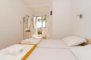 Posteľ alebo postele v izbe v ubytovaní Guest House Misita