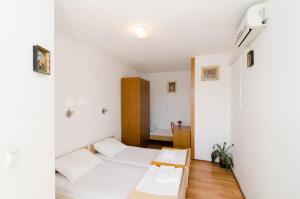 Posteľ alebo postele v izbe v ubytovaní Guest House Misita
