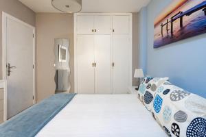 A bed or beds in a room at Home2Book Cozy Beachfront Retreat in El Médano