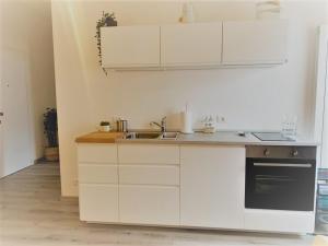 Kuchyňa alebo kuchynka v ubytovaní Maison 53 Incantevole appartamento vista Cattedrale di Como