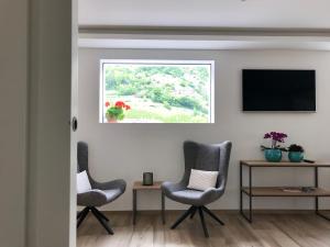 TV a/nebo společenská místnost v ubytování Hotel Quellenhof