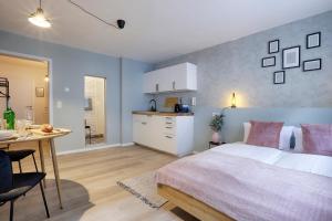 Kuchyň nebo kuchyňský kout v ubytování homie stay Julius Apartments - Iphofen