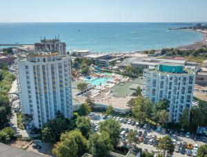 an aerial view of a city and the ocean at Mera Resort in Venus