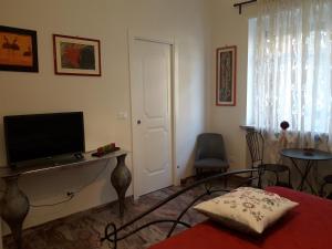 TV a/nebo společenská místnost v ubytování B&B A spasso per Torino