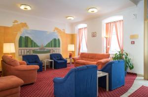 Χώρος καθιστικού στο Garten- und Kunsthotel Gabriel City