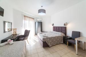 Krevet ili kreveti u jedinici u okviru objekta Anelia Boutique Studios & Apartments